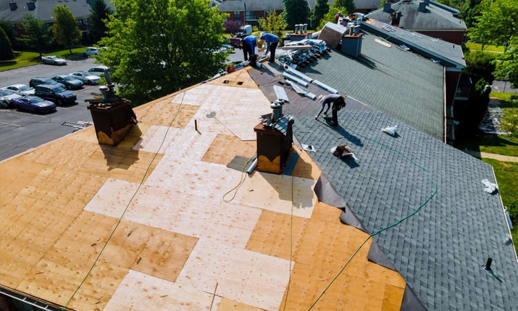 Residential roofing project in the middle of shingle replacement