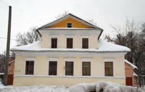 a home with a snowy roof during winter