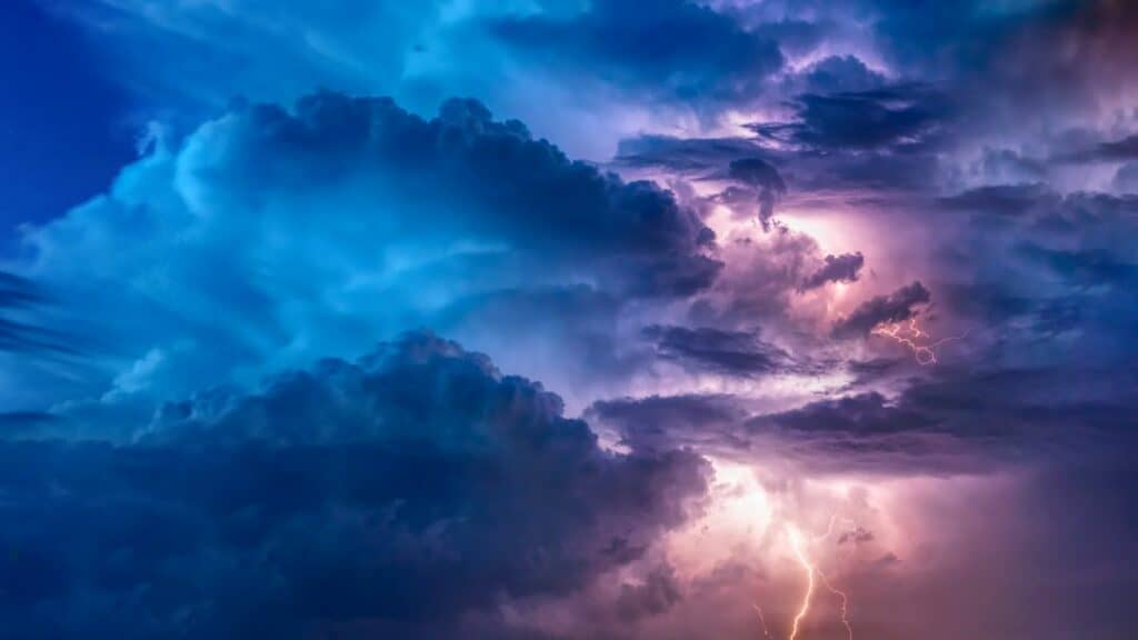 storm clouds bringing potential roof damage