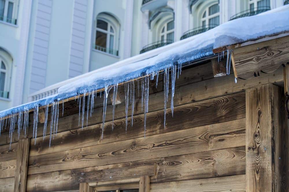 ice dams along the edge of a roof that could cause damage