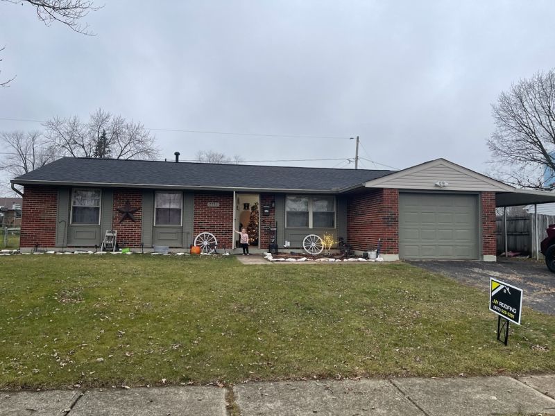 a home in Dayton Ohio with a new roof after a storm damage insurance repair