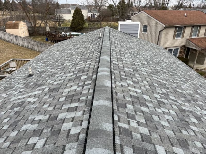 a newly installed roof following storm damage insurance claim