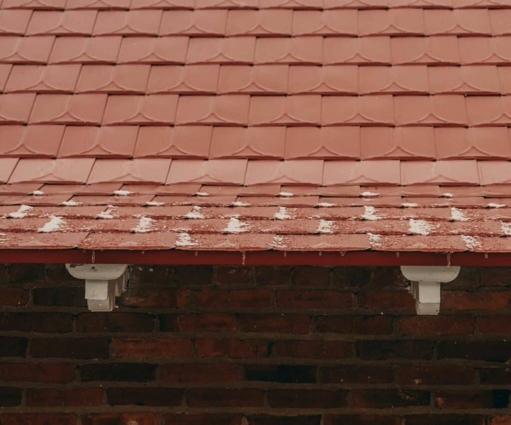 ice and frost on a roofing system in winter JW Roofing Germantown, OH